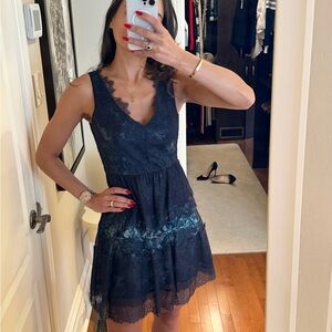 New no tags. BCBGMaxAzria Navy Blue Lace V-Neck Mini Dress with Teal underskirt